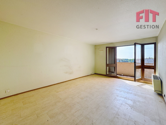 T3 balcon et place de parking