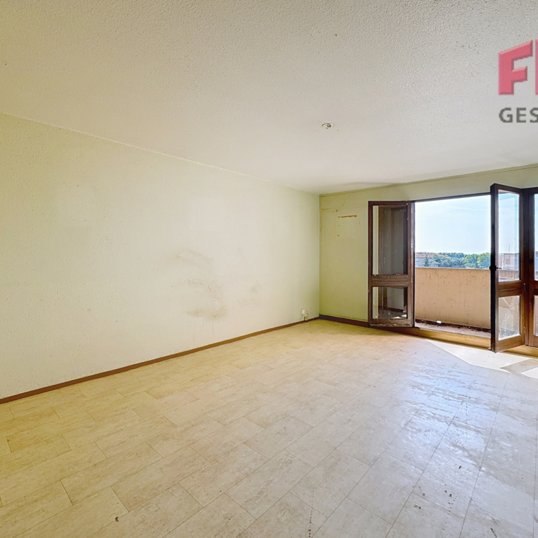 T3 balcon et place de parking