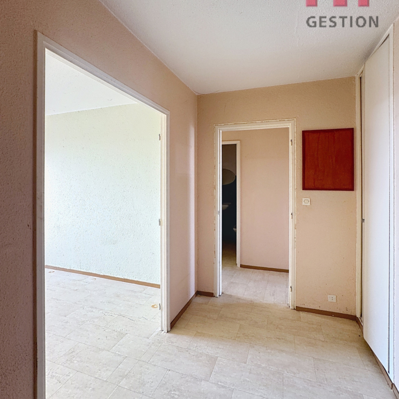 T3 balcon et place de parking